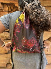 Load image into Gallery viewer, PRAISING MY ROOTS DRAWSTRING BACKPACK - The Art of Poncho
